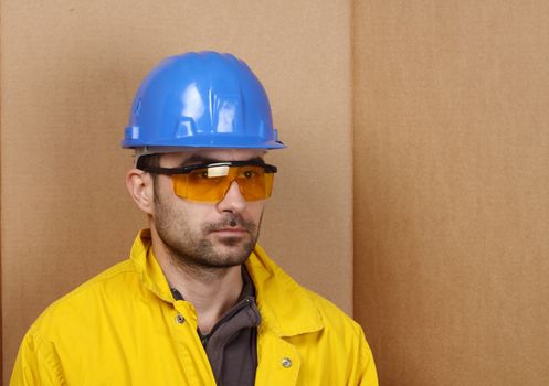 Portrait of worker whit blue helmet