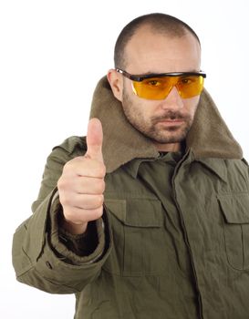 Portrait of men with goggles, thumb up 