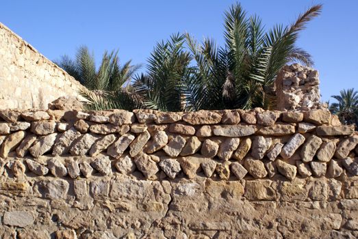 Stone wall in medina Kebili in Tunisia                  