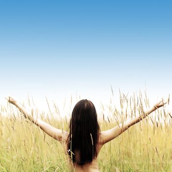 woman on grass field feel freedom