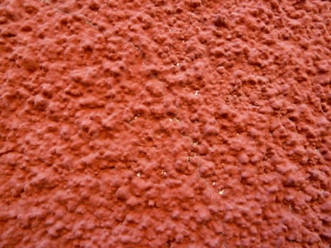 closeup on a section of a red textured surface