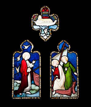 religious stained glass windows in Gloucester Cathedral, England (United Kingdom) (isolated on black background)