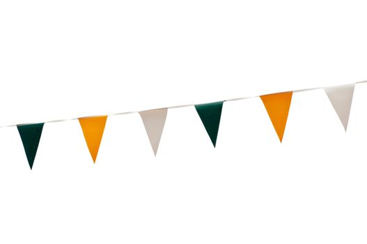 colorful festive green, yellow and white bunting flags (isolated on white background)