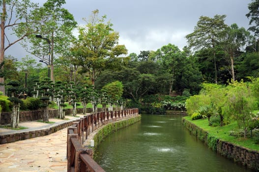 Park with river and decorative trees