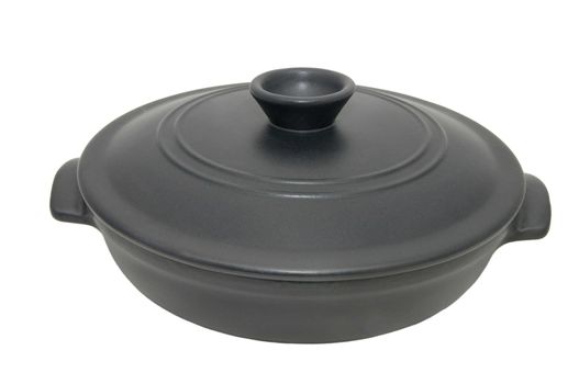 a shallow iron pan on a white background