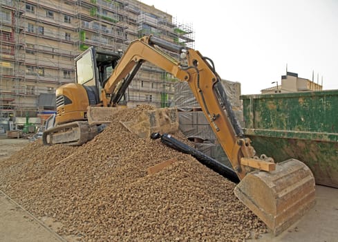 bulldozer on gravel, waiting for a next job