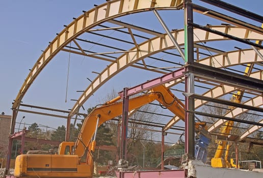 demolition of a building with a bulldozer