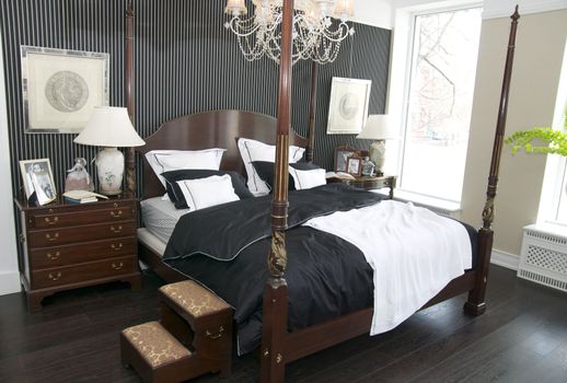cozy bedroom with a queen size bed in the American style