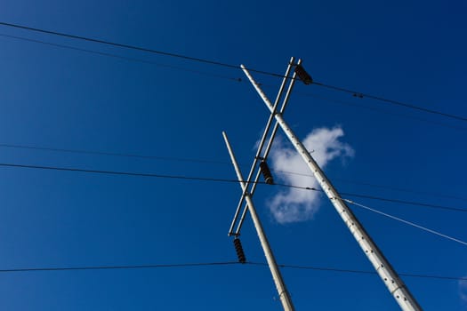 Twin poles of electric power lines cables for provincial distributions