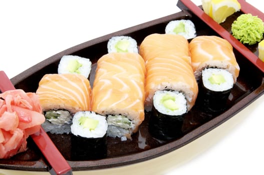 portion of Japanese sushi with fish and rice on a white background