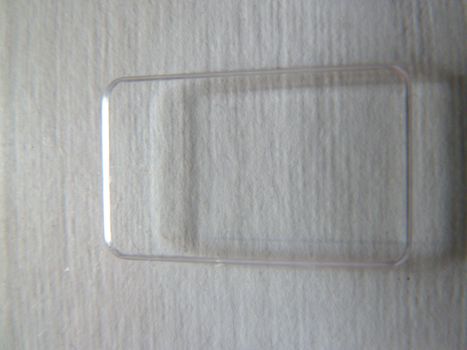 transparent plastic shape on a white background