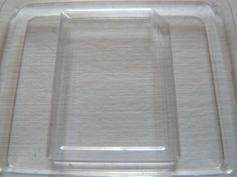 section of a transparent plastic object on white