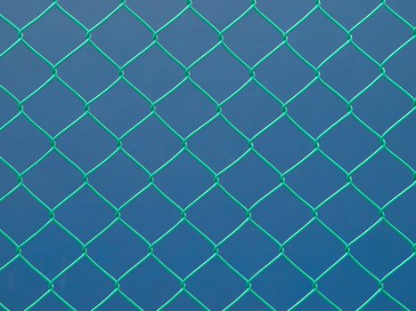 close up of green wire fence