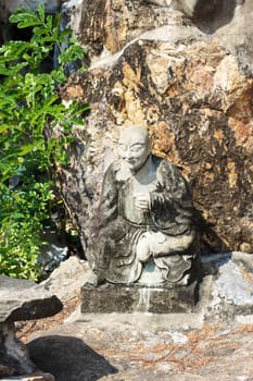 stone statue in Wat Pho, Bangkok, Thailand