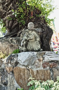 stone statue in Wat Pho, Bangkok, Thailand