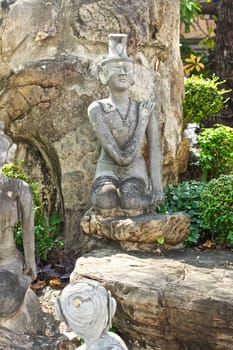 stone statue in Wat Pho, Bangkok, Thailand
