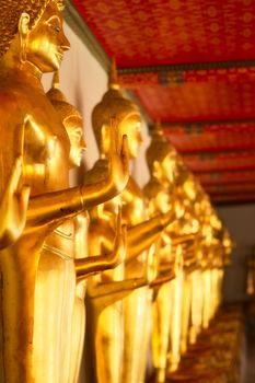 golden statue in Wat Po, Bangkok, Thailand