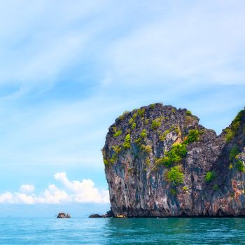 tall cliff with trees at Andaman Sea, Thailand