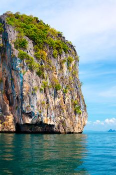 tall cliff with trees at Andaman Sea, Thailand