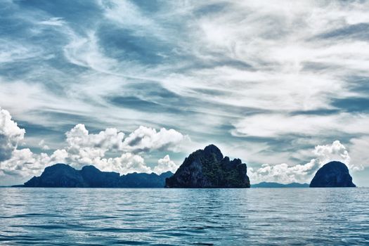 tall cliff with trees at Andaman Sea, Thailand