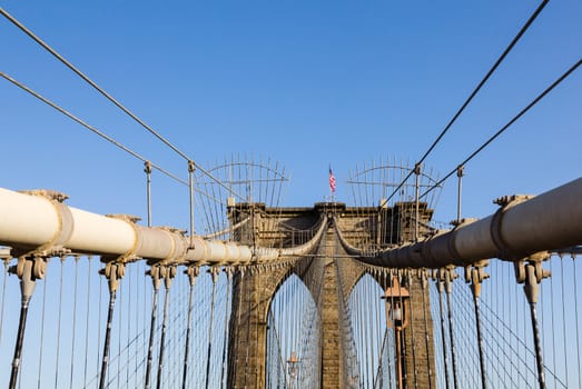 Detail of cables and wires on pier of Brooklyn Bridge in New York