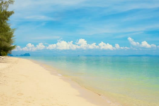 sunny beach and islands on horizon, Thailand