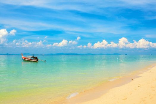 sunny beach and thai traditional boat, Thailand