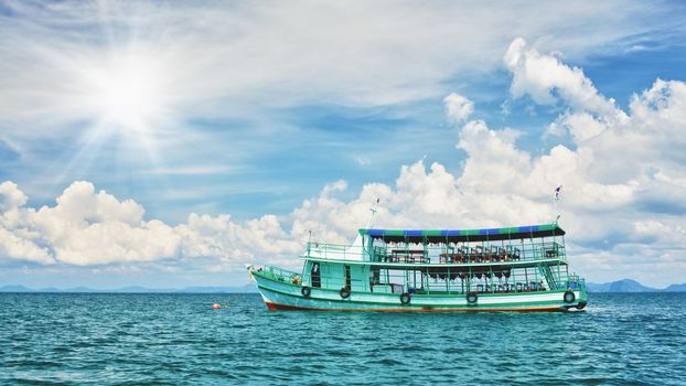 tour ferry at sunny day in Andaman Sea, Thailand