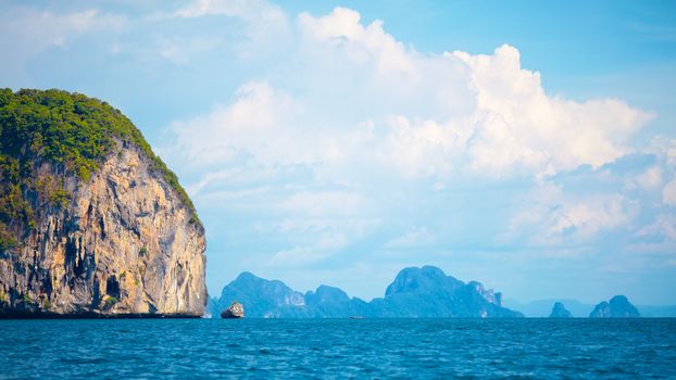 tall cliff with trees at Andaman Sea, Thailand