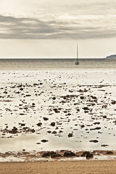 yacht in sea at low tide, Thailand