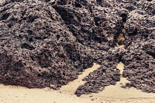 rocks and sand on shore, Thailand, close up