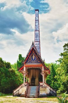 traditional thai crematory in forest at sunny day