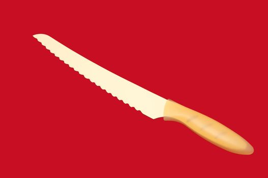 a new knife with a ceramic coating on a red background