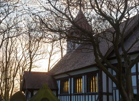 Graveyard and half timbered church of Great Altcar near Southport in England