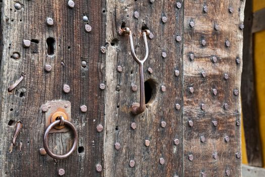 Oak studded door at entrance to Stokesay castle in Shropshire
