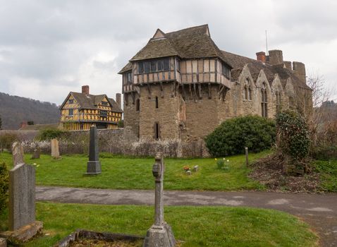 Gatehouse entrance to Stokesay castle on a dark cloudy day