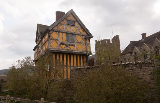 Gatehouse entrance to Stokesay castle on a dark cloudy day