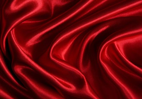 Smooth elegant red silk can use as background 