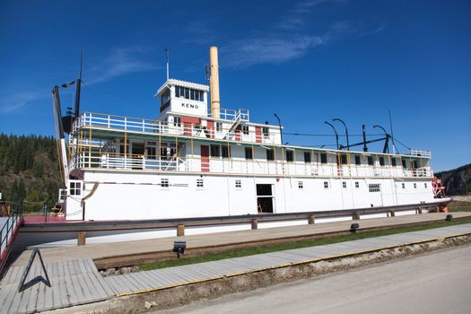 Steamboat docks on the banks of the Yukon River