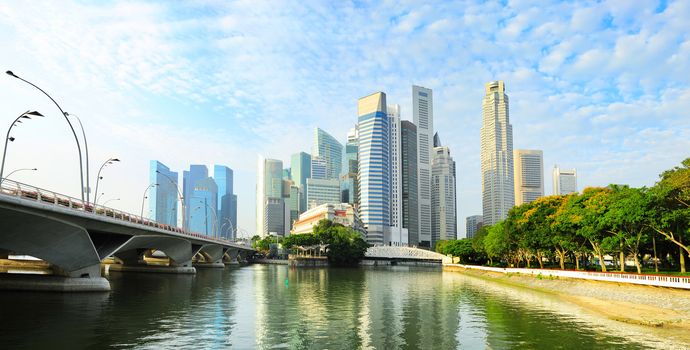 Skyline of Singapore downtown with reflection in the river