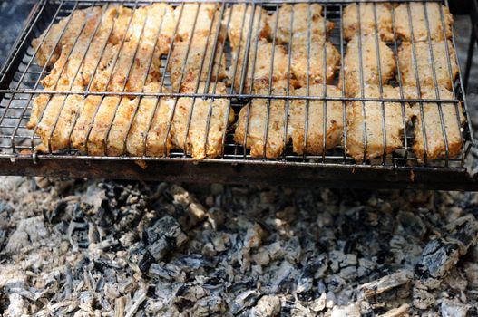 delicious barbeque with grid and coal