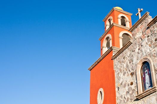 Detail of a Mexican church, brilliant colours