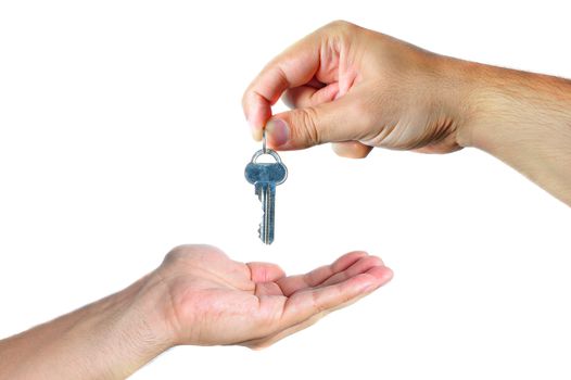 A male's hand giving a key to another male's hand