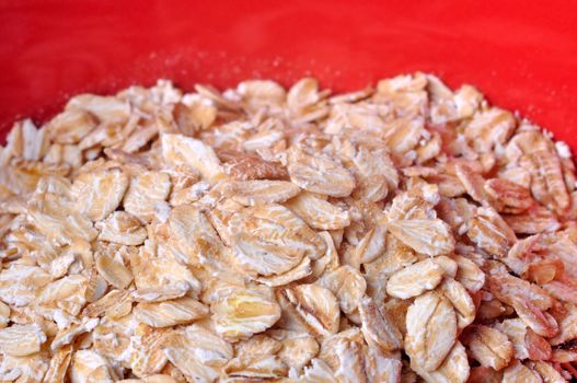Closeup of a red bowl of oatmeal
