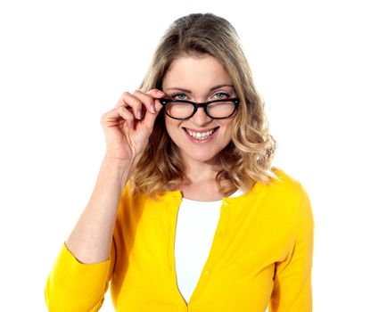 Happy teenage girl with eyeglasses isolated on white background