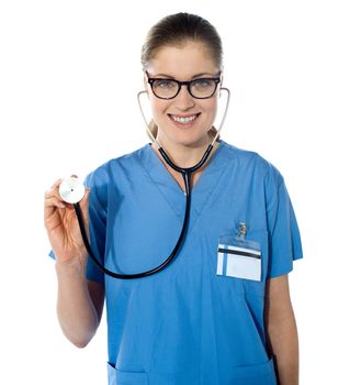 Portrait of a friendly female doctor against a white background