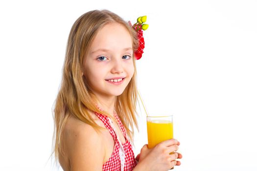 Portrait clouseup of happy little girl drinking orange juice. Isolated over white background.