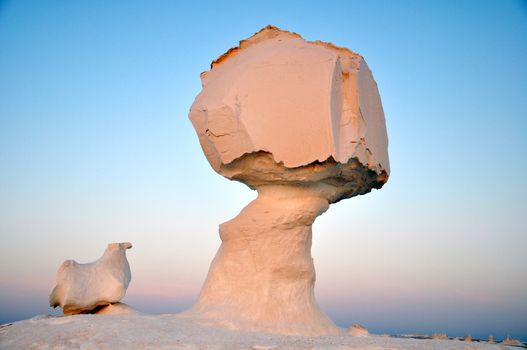 Landscape of the famous white desert in Egypt at sunrise
