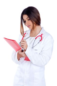 brunette asian indian doctor woman writting in red folder and stethoscope