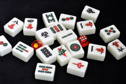Chinese mahjong tiles on a black background